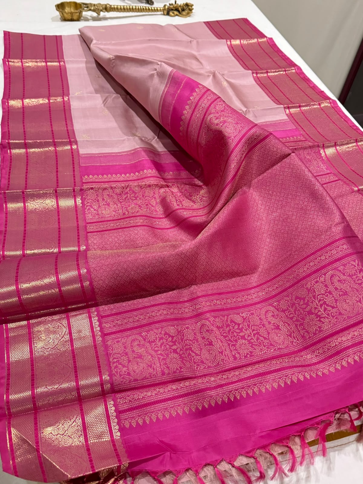 Pink and gold handloom saree from Varnaa Handlooms