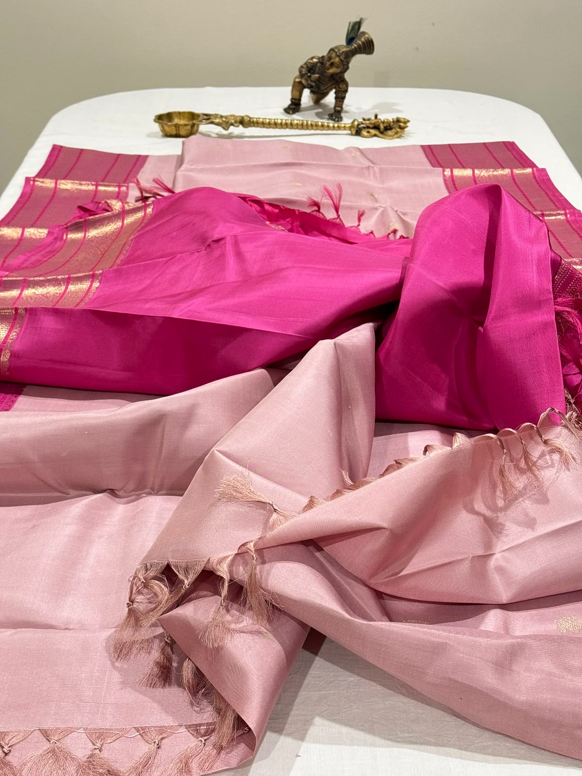 Pink saree fabric and tassels